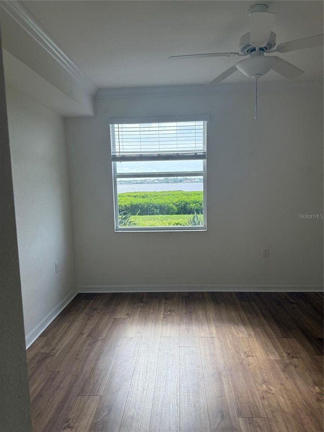 1020 Tidewater Shores Loop Unit 108, Bradenton, FL 34208 - empty room featuring wood finished floors, ornamental molding, and ceiling fan