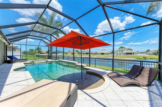 view of swimming pool with a lanai, an in ground hot tub, a water view, and a patio