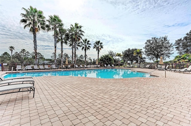 view of swimming pool featuring a patio area