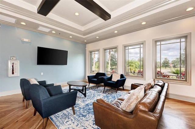 living room with beam ceiling, ornamental molding, and light parquet floors