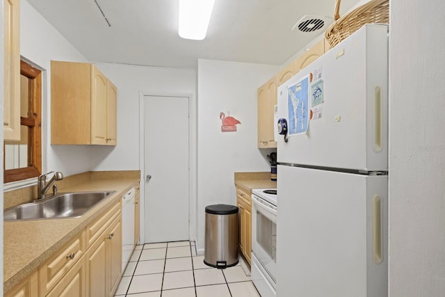 kitchen featuring light tile patterned floors, white appliances, sink, and light brown cabinetry