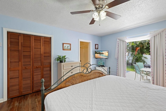 bedroom featuring access to outside, ceiling fan, a closet, and a textured ceiling