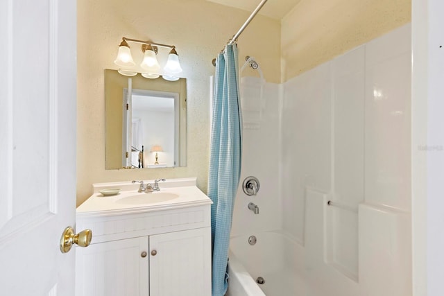 bathroom featuring vanity and shower / tub combo with curtain