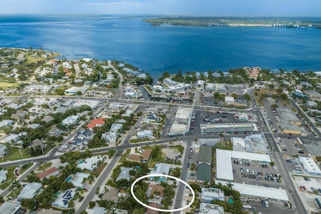 birds eye view of property featuring a water view