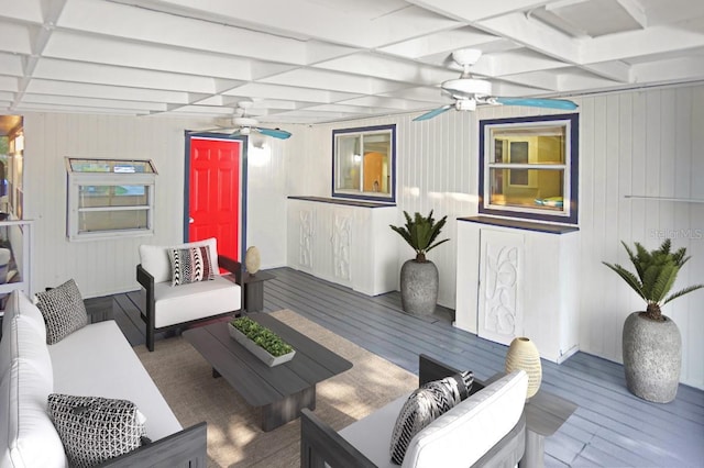 wooden deck with ceiling fan and an outdoor hangout area