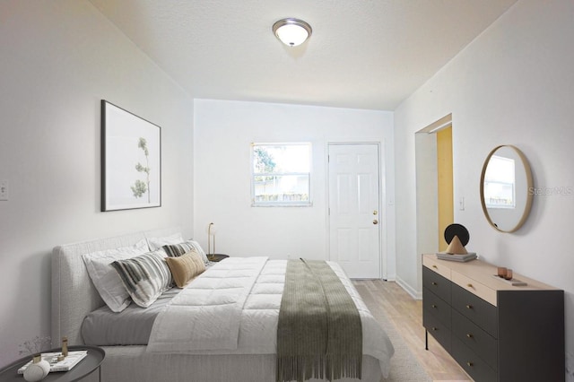 bedroom featuring vaulted ceiling