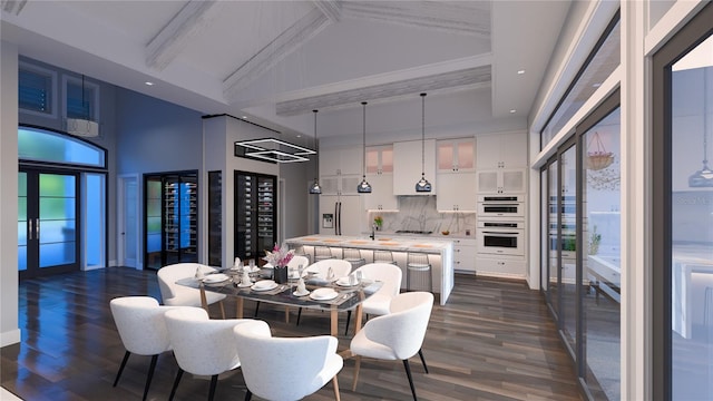 dining area with dark hardwood / wood-style flooring, high vaulted ceiling, and sink