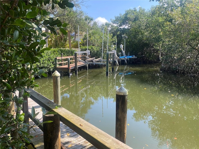 view of dock featuring a water view