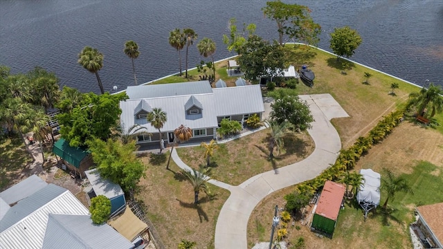 birds eye view of property featuring a water view