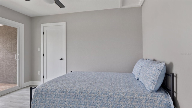 bedroom featuring ceiling fan and light wood-type flooring