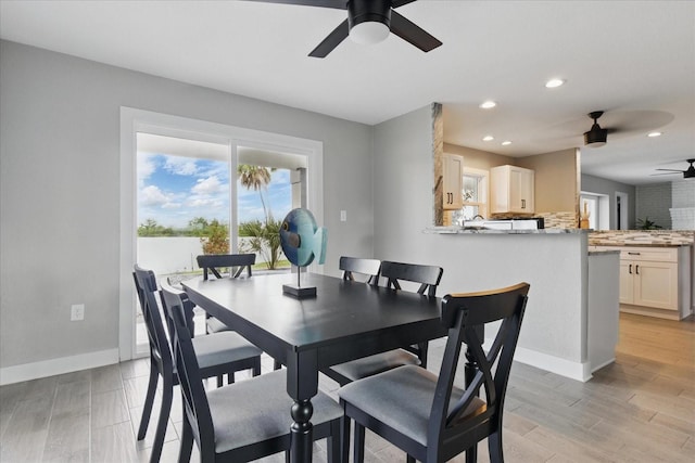 9610 SW Yacht Dr, Arcadia, FL 34269 - dining area with baseboards, a ceiling fan, recessed lighting, and light wood-type flooring
