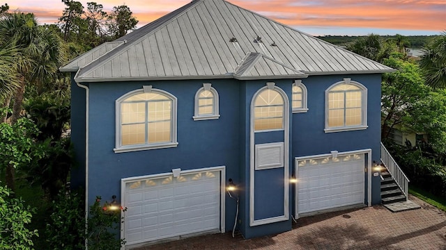 view of front of property featuring a garage