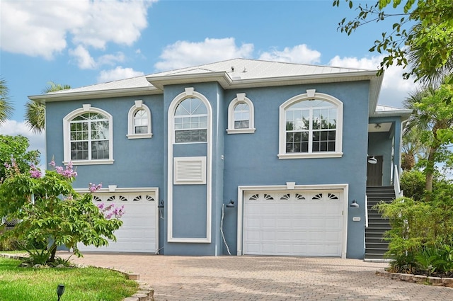 view of front of property featuring a garage