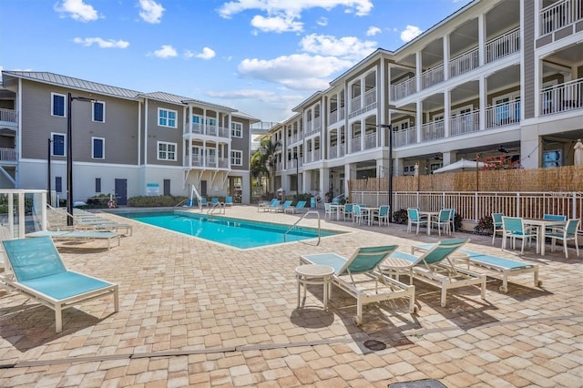 view of pool featuring a patio