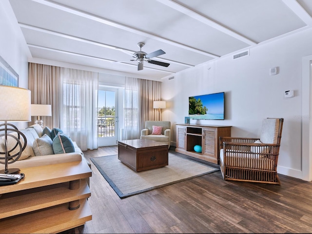 living room with ceiling fan and hardwood / wood-style flooring