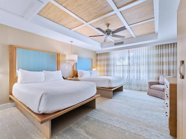 bedroom featuring ceiling fan, carpet floors, and coffered ceiling