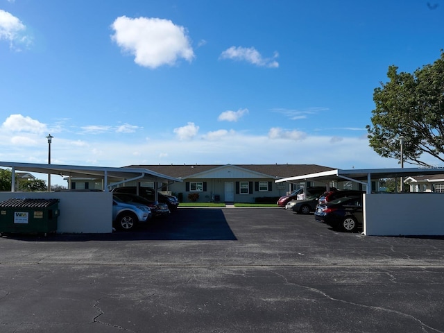 view of car parking with a carport