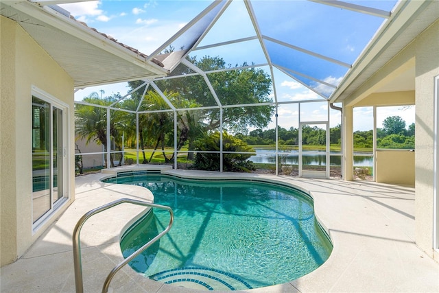 view of pool featuring a lanai, a water view, and a patio