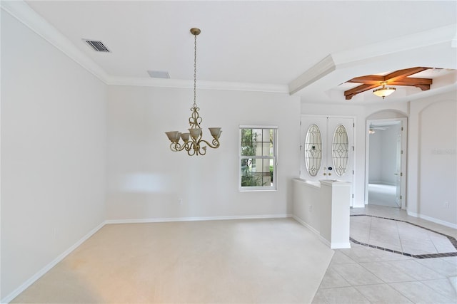 tiled spare room featuring crown molding and ceiling fan with notable chandelier