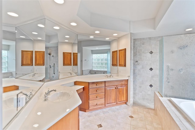 bathroom with tile patterned floors, vanity, and plus walk in shower