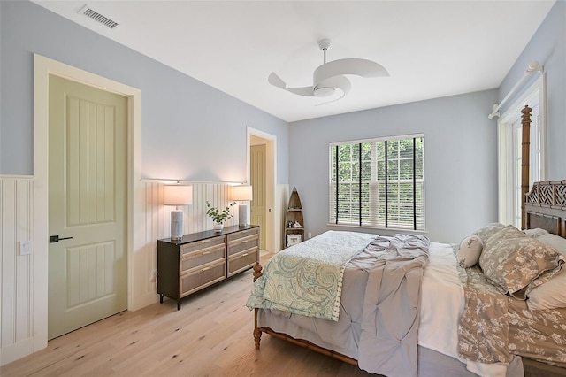 bedroom featuring ceiling fan and light wood-type flooring