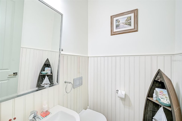 bathroom with sink and toilet