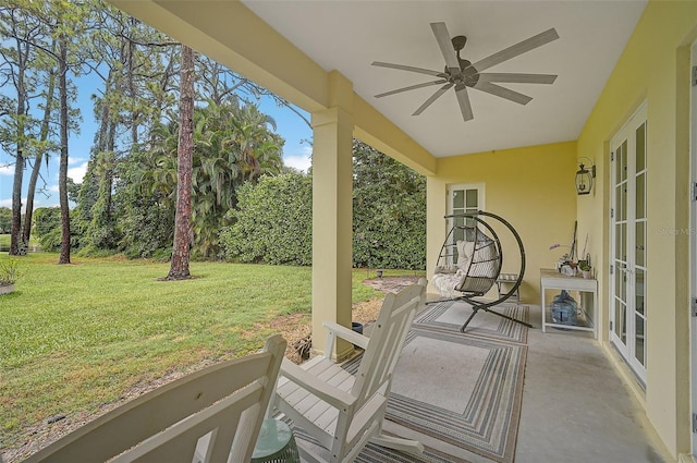 exterior space featuring ceiling fan