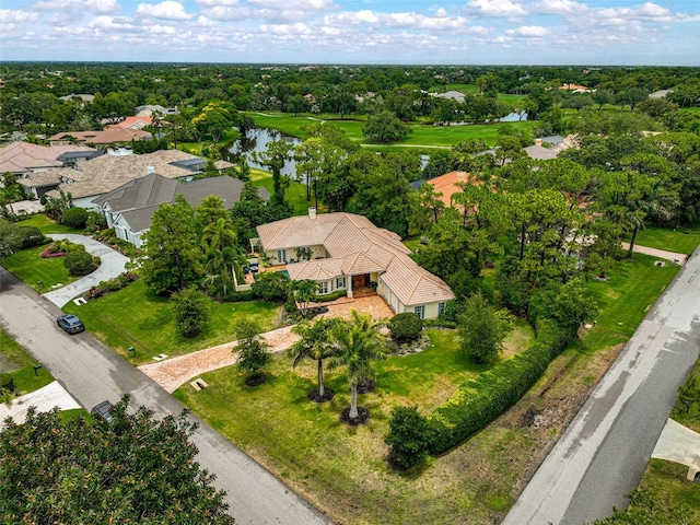 bird's eye view with a water view