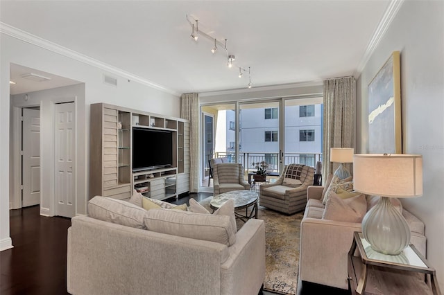 living room with dark hardwood / wood-style floors and ornamental molding