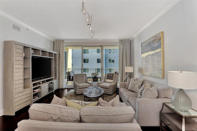 living room featuring ornamental molding and dark wood-type flooring