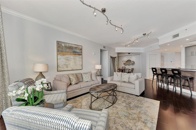 living room featuring dark wood-type flooring and ornamental molding