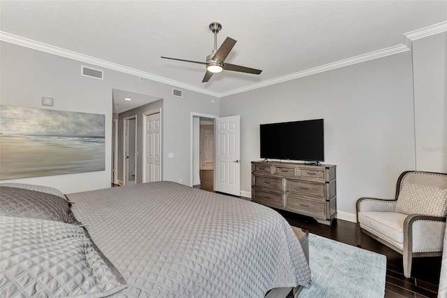 bedroom featuring ceiling fan, crown molding, and dark wood-type flooring