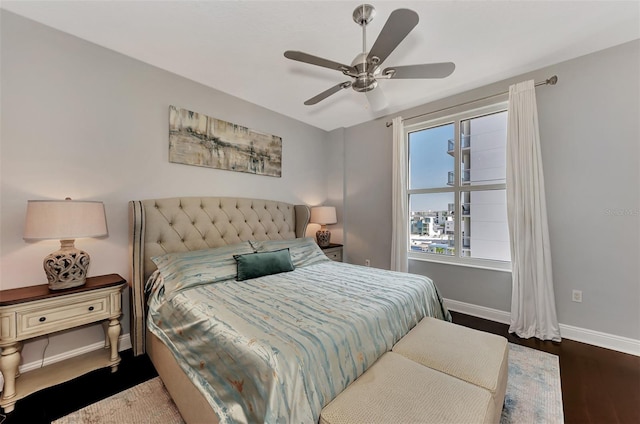 bedroom with ceiling fan and hardwood / wood-style flooring