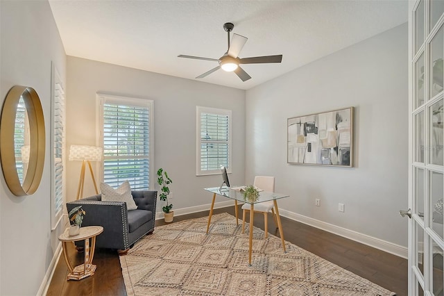 office featuring hardwood / wood-style flooring and ceiling fan