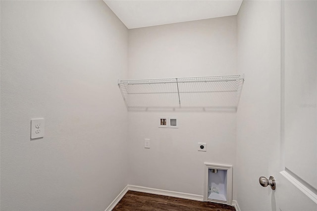 washroom featuring dark hardwood / wood-style flooring, washer hookup, and hookup for an electric dryer