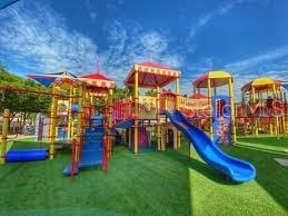 view of playground featuring a lawn