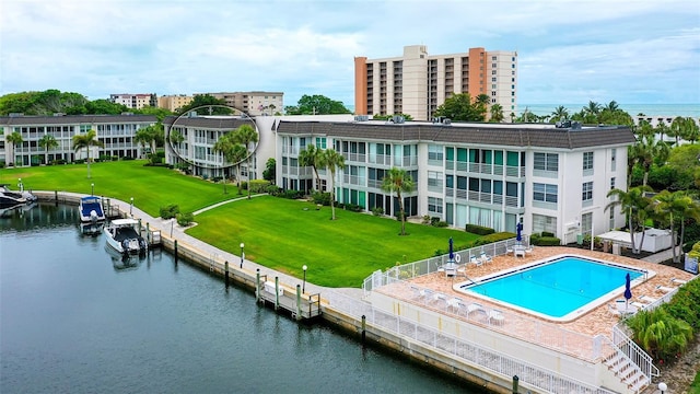 exterior space featuring a patio and a water view