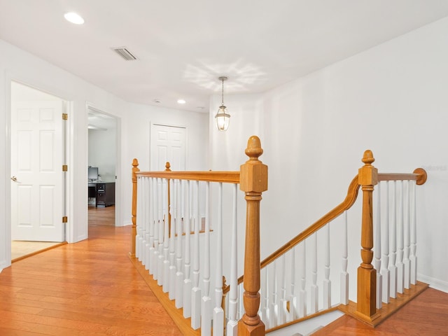 hallway featuring light hardwood / wood-style flooring