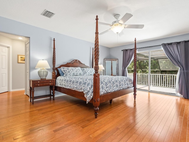 bedroom with ceiling fan, access to exterior, and wood-type flooring