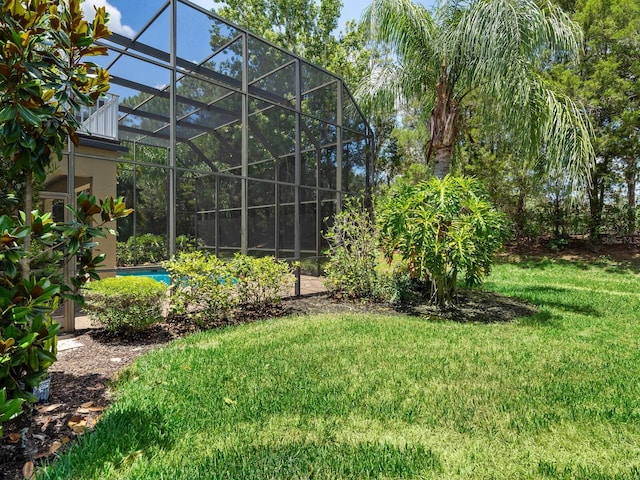 view of yard featuring a lanai