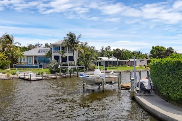 dock area featuring a water view