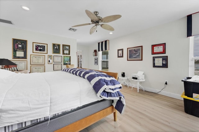 bedroom featuring ceiling fan and light hardwood / wood-style floors