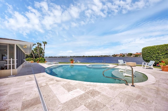 view of pool with a sunroom, a water view, an in ground hot tub, and a patio