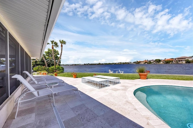 view of swimming pool with a water view, a yard, a patio, and a sunroom