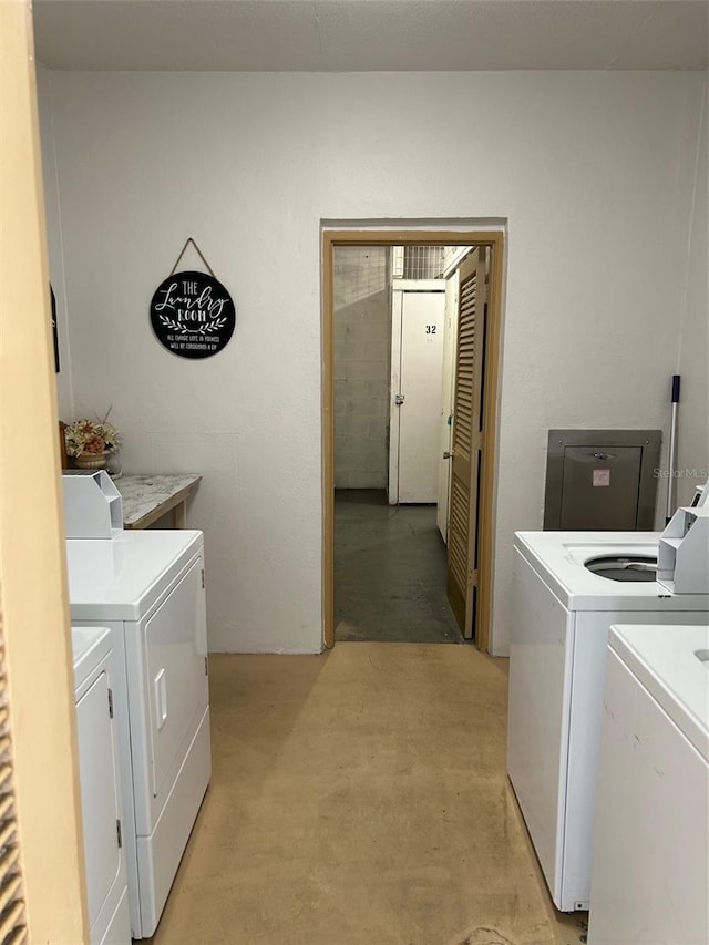 laundry area with washing machine and dryer