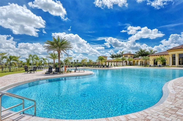 view of swimming pool featuring a patio