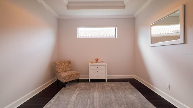 unfurnished room with dark hardwood / wood-style flooring, a raised ceiling, and crown molding