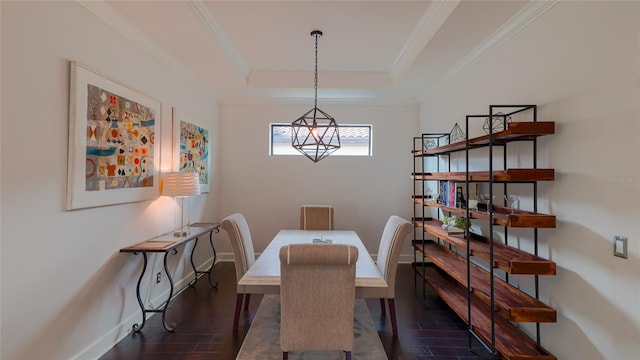 dining space featuring a tray ceiling, crown molding, and dark hardwood / wood-style floors