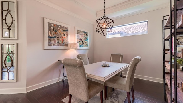 dining space featuring a chandelier, crown molding, a wealth of natural light, and dark wood-type flooring