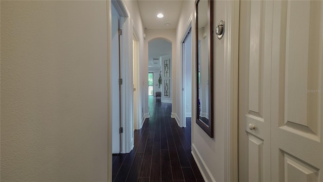 hall featuring dark wood-type flooring